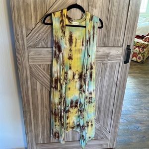 Very unique cardigan vest in full length.  Worn maybe once, basically new.